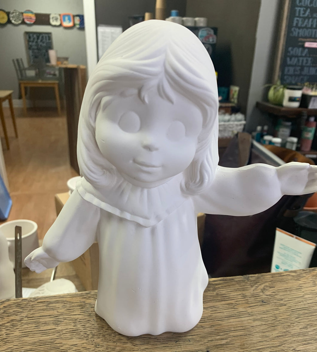 Girl kneeling with arms up Angel shelf sitting